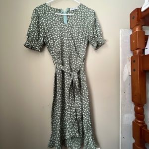 Green dress with white flower pattern